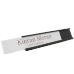 A black name plate holder for desks