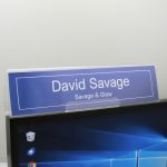 A name plate holder for computer monitors