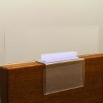 A name plate holder for partitions