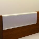 A name plate holder for partitions
