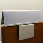 A name plate holder for partitions